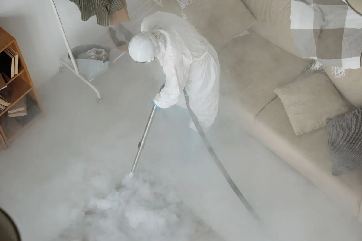 Biohazard cleanup technician in protective equipment, Pike Road, AL
